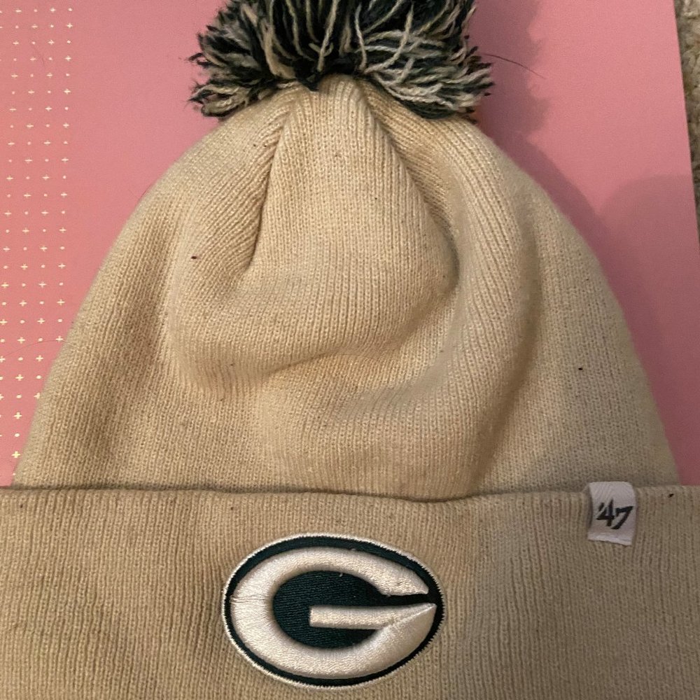 Packer pom hat